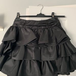 Black satin mini skirt
